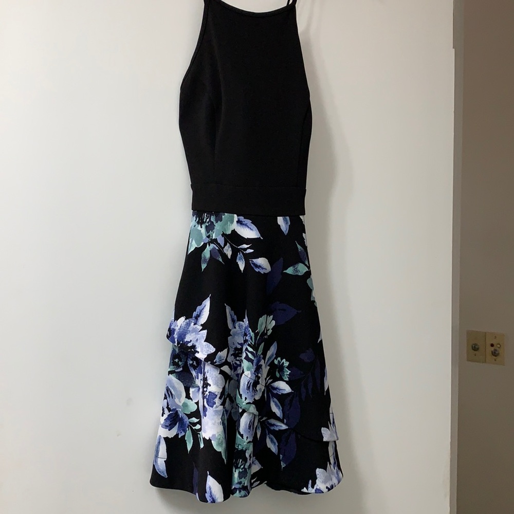 Very cute, flowered dress.